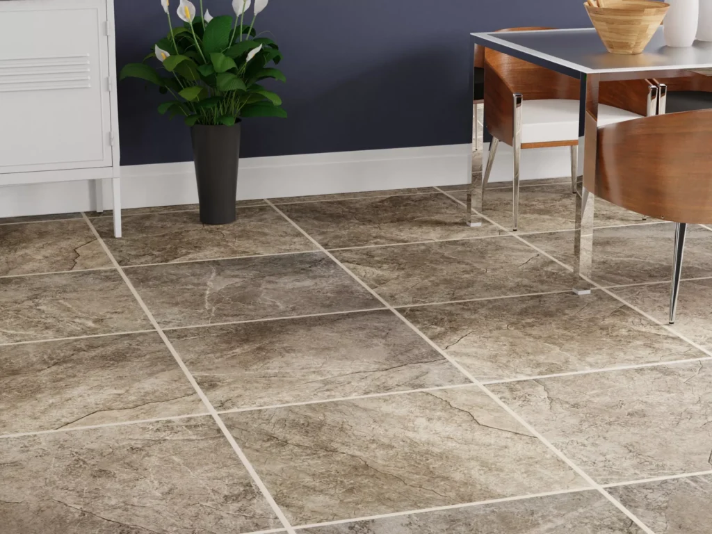 Stylish brown tile floor with a plant and dining table in a contemporary interior